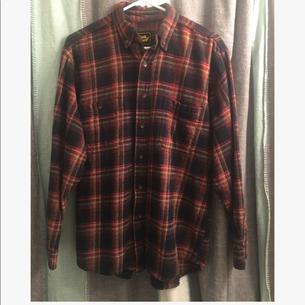 Men’s red/yellow/black flannel shirt.